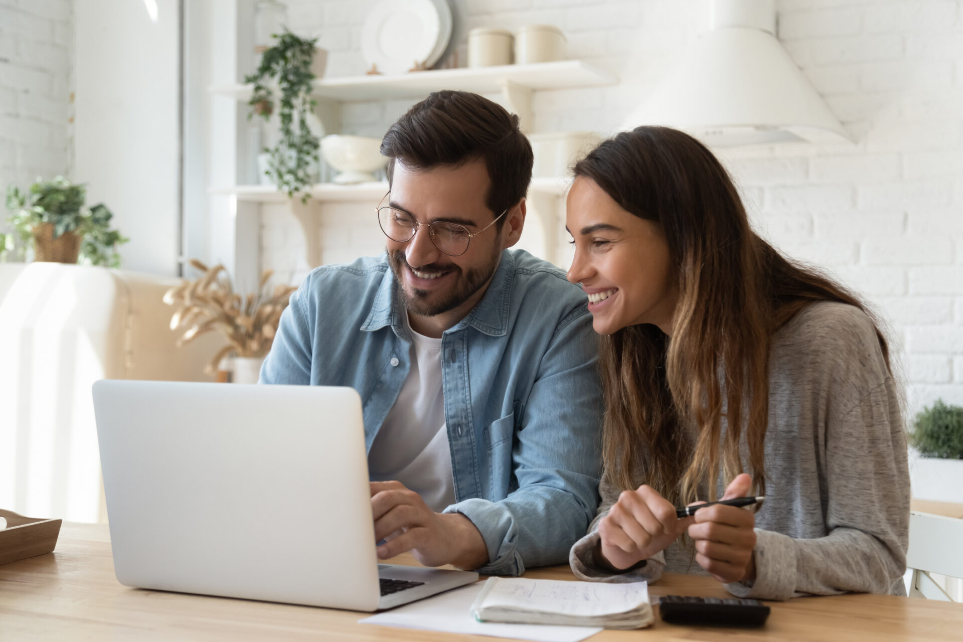 couple viewing laptop